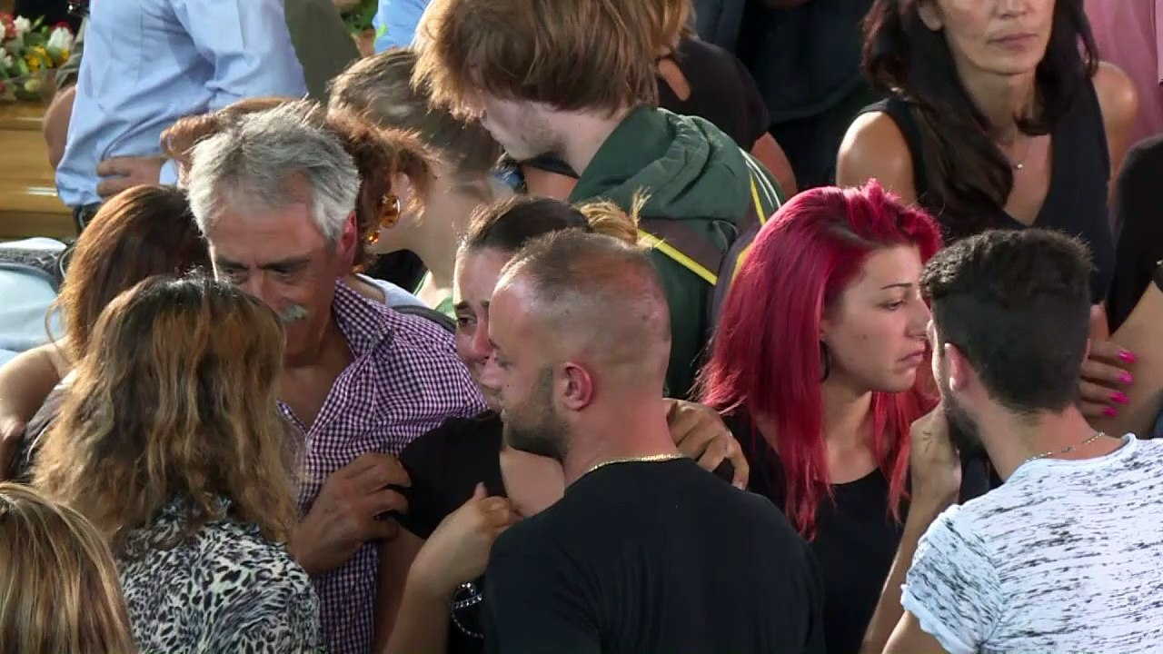 Italy mourns quake victims at funeral attended by PM, president