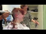 Redhead shaves her head bald for Bowel Cancer UK
