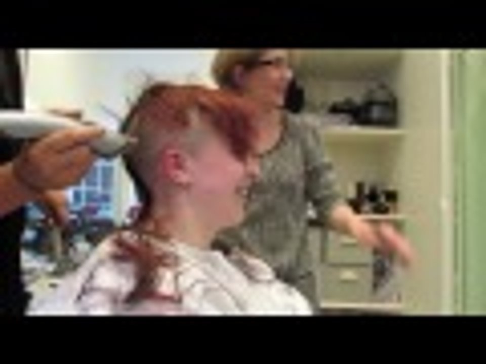 Redhead shaves her head bald for Bowel Cancer UK