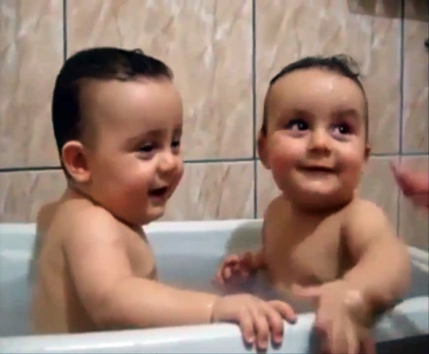 Twins Brothers Enjoying Bath Time