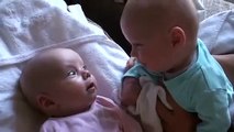 Very cute adorable twin babies talking to each other - Very Funny - Must Watch