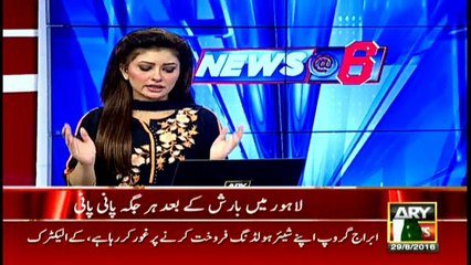 Students pull their own school van in Lahore rain