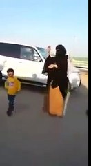 Arabic Women dancing on the Road carelessly