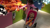 Little Girl Pushing Baby doll Stroller / Going to the store