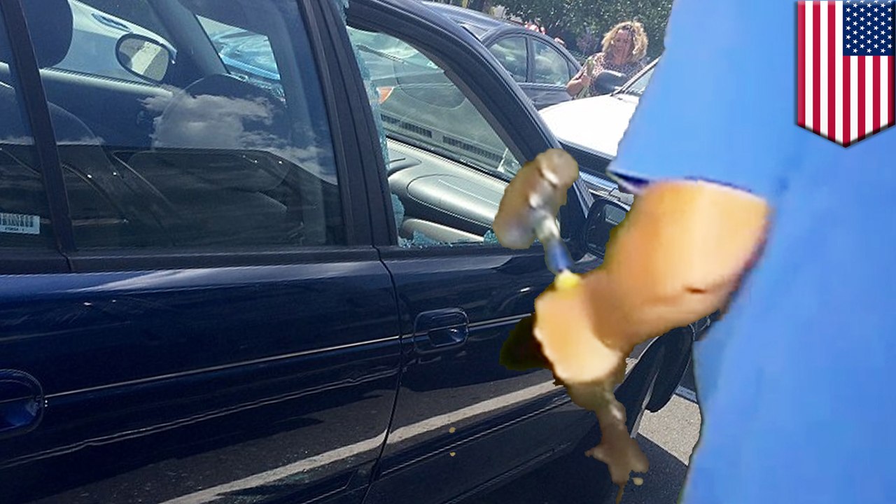 Baby trapped in hot car: Duo rescue break 4-month-old out of car with sledgehammer - TomoNews