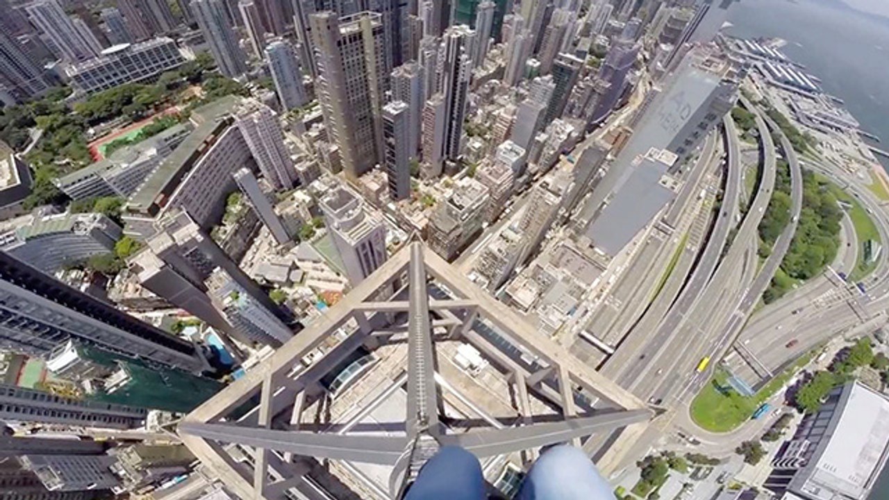 Daredevils Climb Hong Kong Skyscraper To Captur...