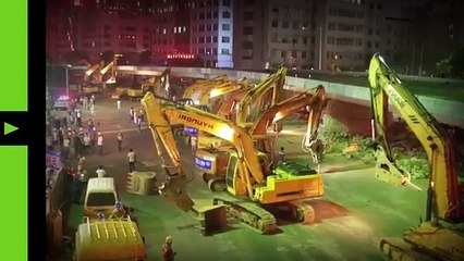 Meanwhile in China_ Over 100 excavators dismantle overpass bridge