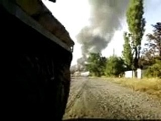 Уничтоженные «КамАЗ» и автобус с российскими морпехами при вьезде в Фёдоровку