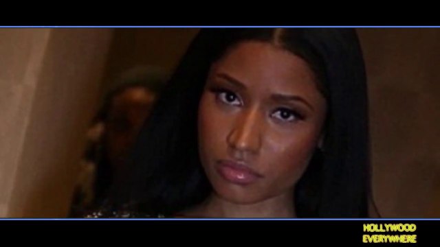 Nicki Minaj Exposes NIPPLES beneath Sheer Net top