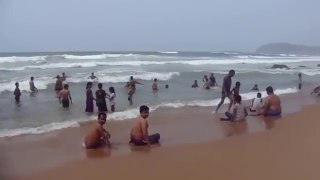 People Enjoy  In Sea-Beach To Bathing In Sea
