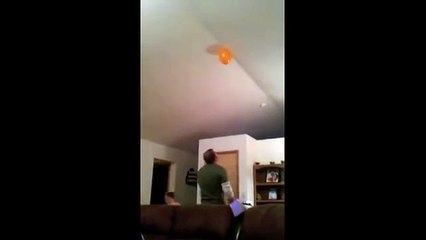 Dad Throws Son to Grab Balloon on Ceiling