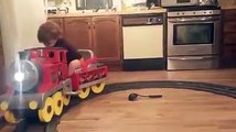 Boy Falls Asleep On Toy Train