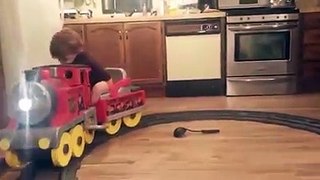 Boy Falls Asleep On Toy Train