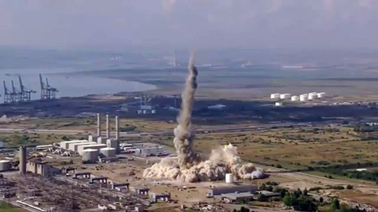 Drone view of Grain A Power Station chimney being demolished - Isle of Grain Chimney Explosion