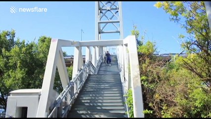 Man skis down stairs in downtown Portland