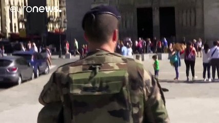 French police detain two after gas canisters found in Paris car