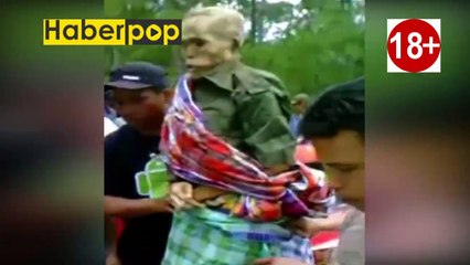 Mezardan ölüleri çıkarıp elbise giydirdiler #mezar #Manene