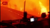 Veja imagens dramáticas de bombeiros cercados por fogo
