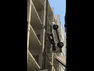 Driver Escapes Dangling Car in Austin