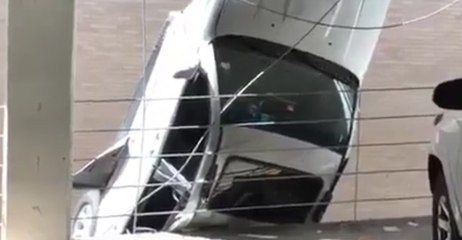 Austin Man Drives Off Parking Garage; Car Dangles Midair
