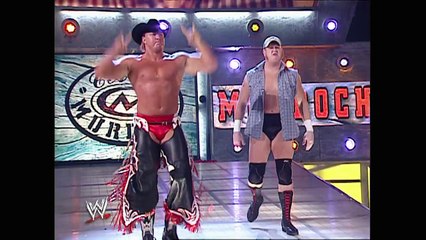Ric Flair and Carlito (w/ Torrie Wilson) vs. Lance Cade and Trevor Murdoch