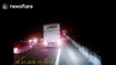 Men set Calais road on fire
