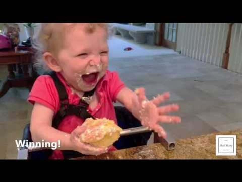 Adorable Girl Really Enjoys Her First Cupcake