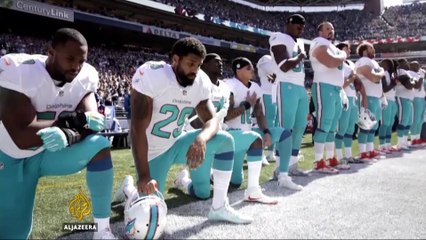More black NFL players join inequality protest