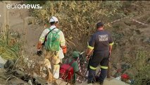 South Africa: emergency service work to save illegal workers trapped in mine