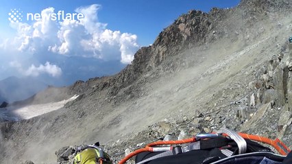 Climbers look for cover during rockfall on Mont Blanc