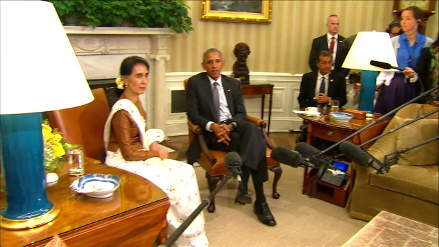 Obama vows to lift Myanmar sanctions as Suu Kyi visits