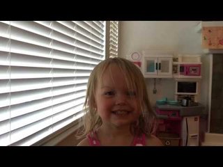 Young Girl and Her Dad Practice Their Batman Voices