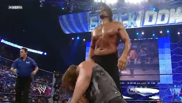 Triple H vs The Great Khali Broken Glass Arm Wrestling