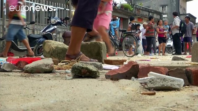 Pro-democracy activists in Hong Kong protest against Wukan clashes