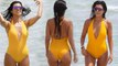Kourtney Kardashian Stuns in Yellow Swimsuit in Miami