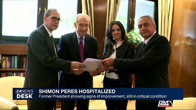 Shimon Peres showing signs of improvement, still in critical condition