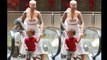 Amber Rose Shows Off Some Extreme Cleavage In White Low-Cut Dress !!