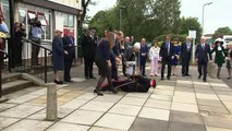 Prince William helps dignitary who falls to the ground