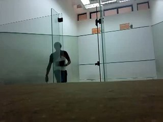Squash: ramy ashour hitting nick from oustside the court