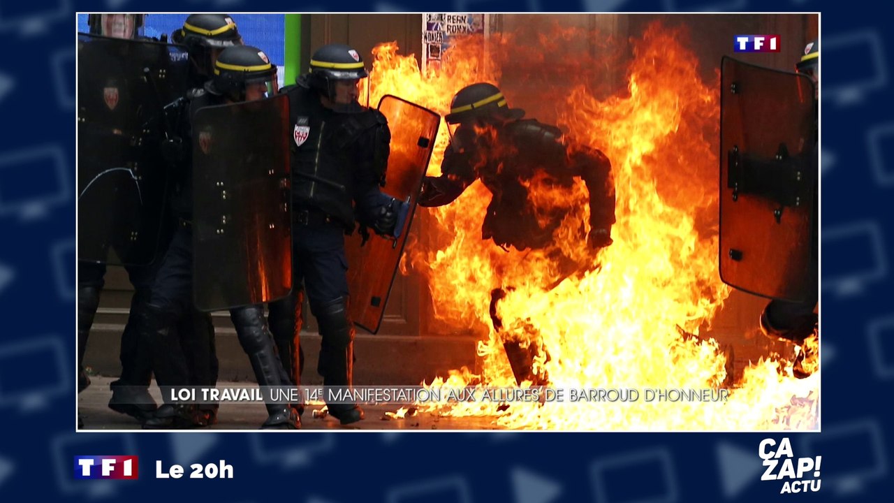 Un CRS en feu pendant la manifestation contre la loi Travail