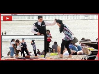 انتصار فتاة على شرطي حاول نزع "البوركيني" من عليها حديث مواقع التواصل..