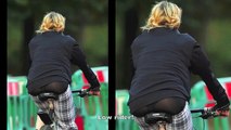 Madonna suffers wardrobe malfunction as she flashes her thong during a London bike ride