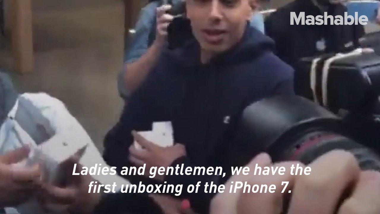 iPhone fans around the world line up overnight