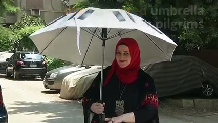 For Muslim pilgrims, solar-powered umbrella offers cool respite