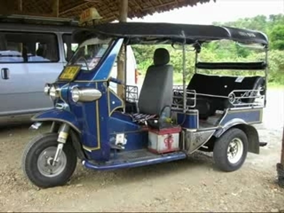 TUKTUK IN THE RAIN