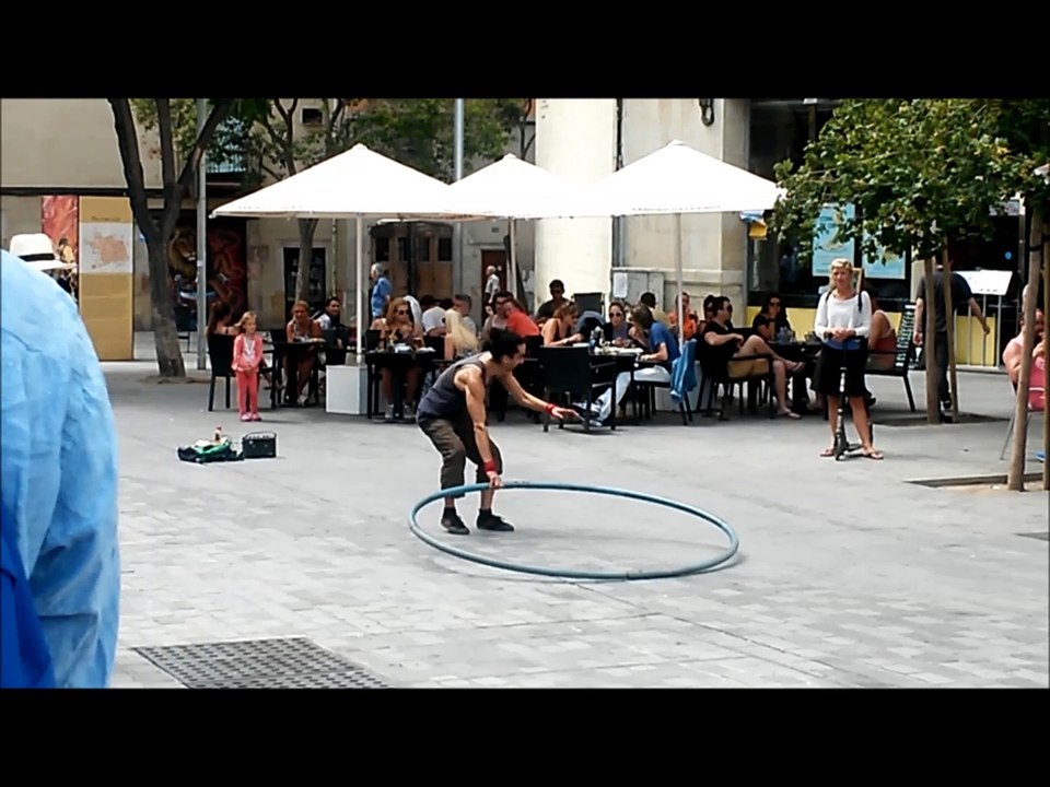 Cyr Wheel street performer in Barcelona 15.08.14