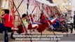 Rockets-turned-swings and hidden playgrounds delight Syrian kids