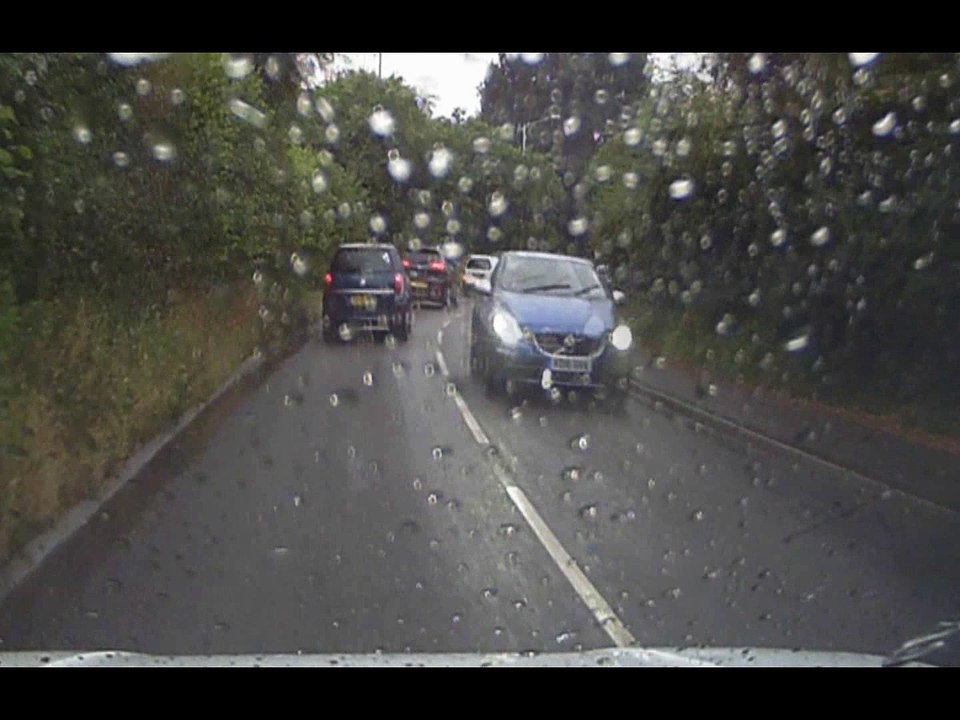 Driver Splashes Pedestrian