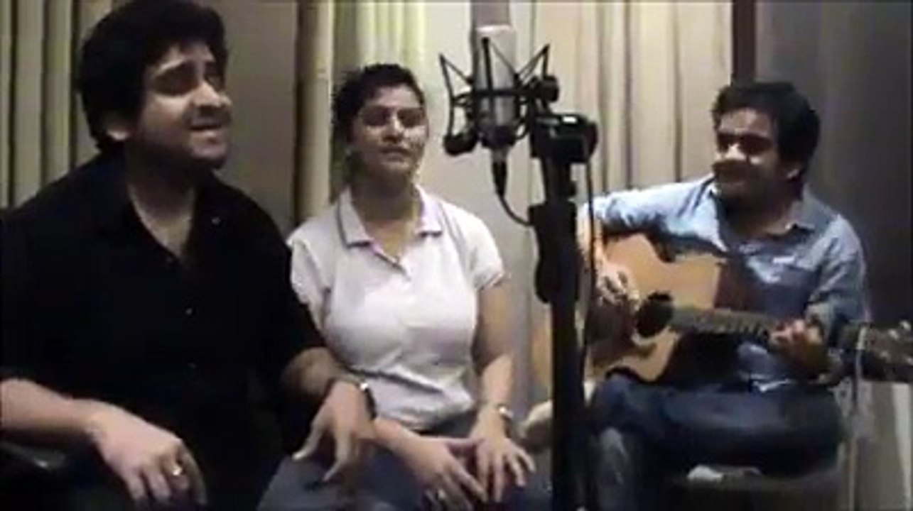 Amazing voices, and guitar playing! Who are these three?