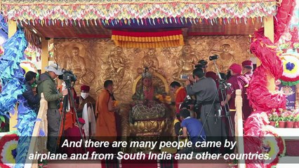 Devotees flock to India's mountains for a Buddhist festival